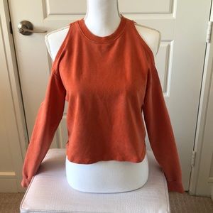 Orange exposed shoulder sweater